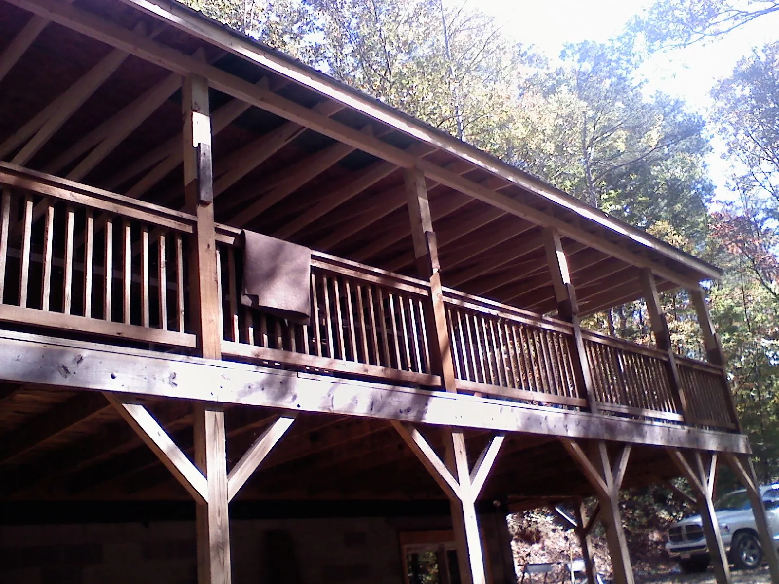 Timber framing under a new elevated porch and deck — Roof Leak Repair in Denair by Roofing Brothers